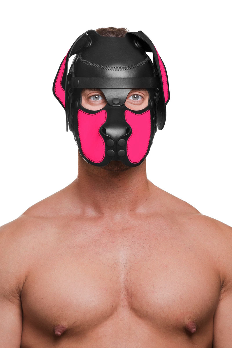 Shirtless man in an adorable ARMY OF MEN leather pup hood, with fluorescent pink ears and snout, and matte black hardware.