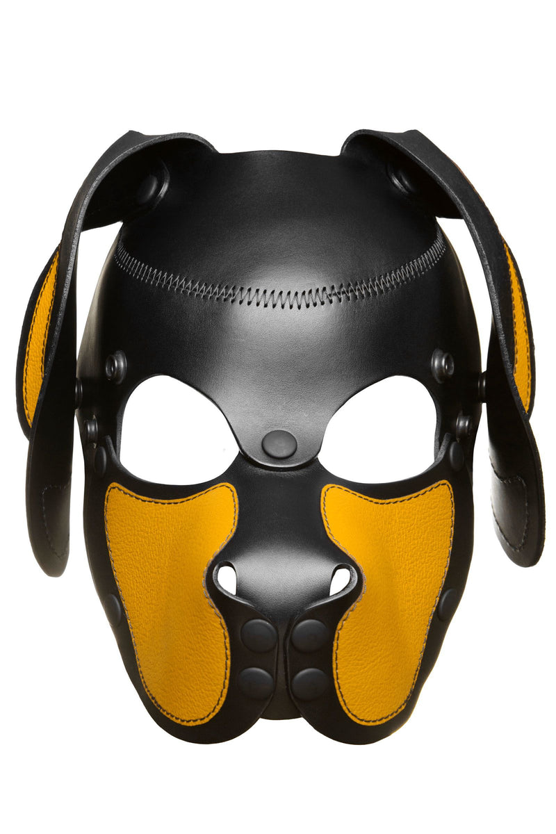 Front-facing product photo of a yellow-eared leather pup mask with hard-wearing matte black metal snaps and rivets.