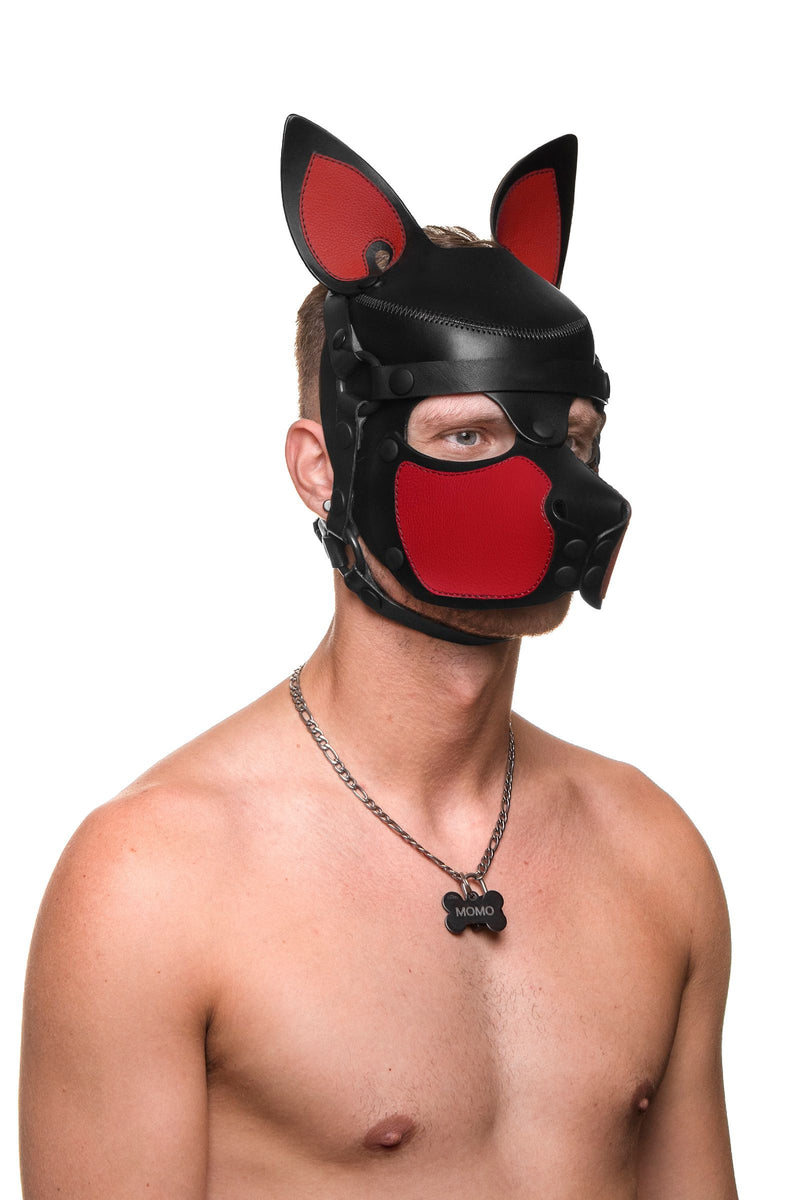 Buff shirtless male model in an adorable ARMY OF MEN black and red leather SCOUT pup hood with distinctive pointy ears.