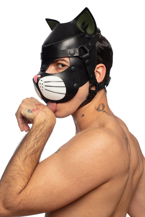 Cute model wearing only an ARMY OF MEN TOMCAT hood, featuring army green ears, white whisker pads, and a soft pink nose.