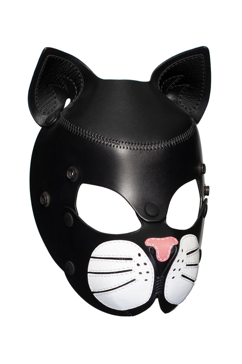 Three-quarter view of a black leather TOMCAT mask with black ears, white whisker pads, and soft pink nose.