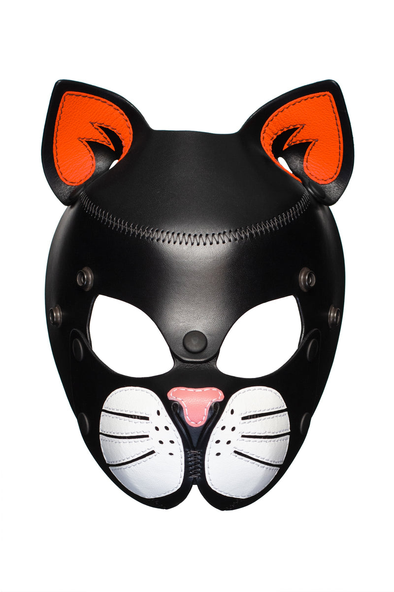 Front product photo of a TOMCAT mask with neon orange ears and white whisker pads.