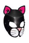 Three-quarter view of TOMCAT mask with fluorescent pink ears and white whisker pads.