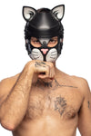Model posing in a black and white leather ARMY OF MEN cat hood, staring straight at you and licking his paw.