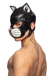 Seductive, shirtless model looking over his shoulder, dressed only in an ARMY OF MEN black and white leather TOMCAT hood.