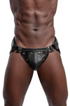 Male model in a leather ARMY OF MEN COMBAT JOCK, made with stainless steel rivets, snaps, and O-rings, front facing view.