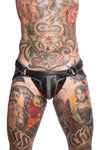 Front-on shot of toned model in a distinctive ARMY OF MEN black and grey leather Combat jockstrap with matte black snaps.