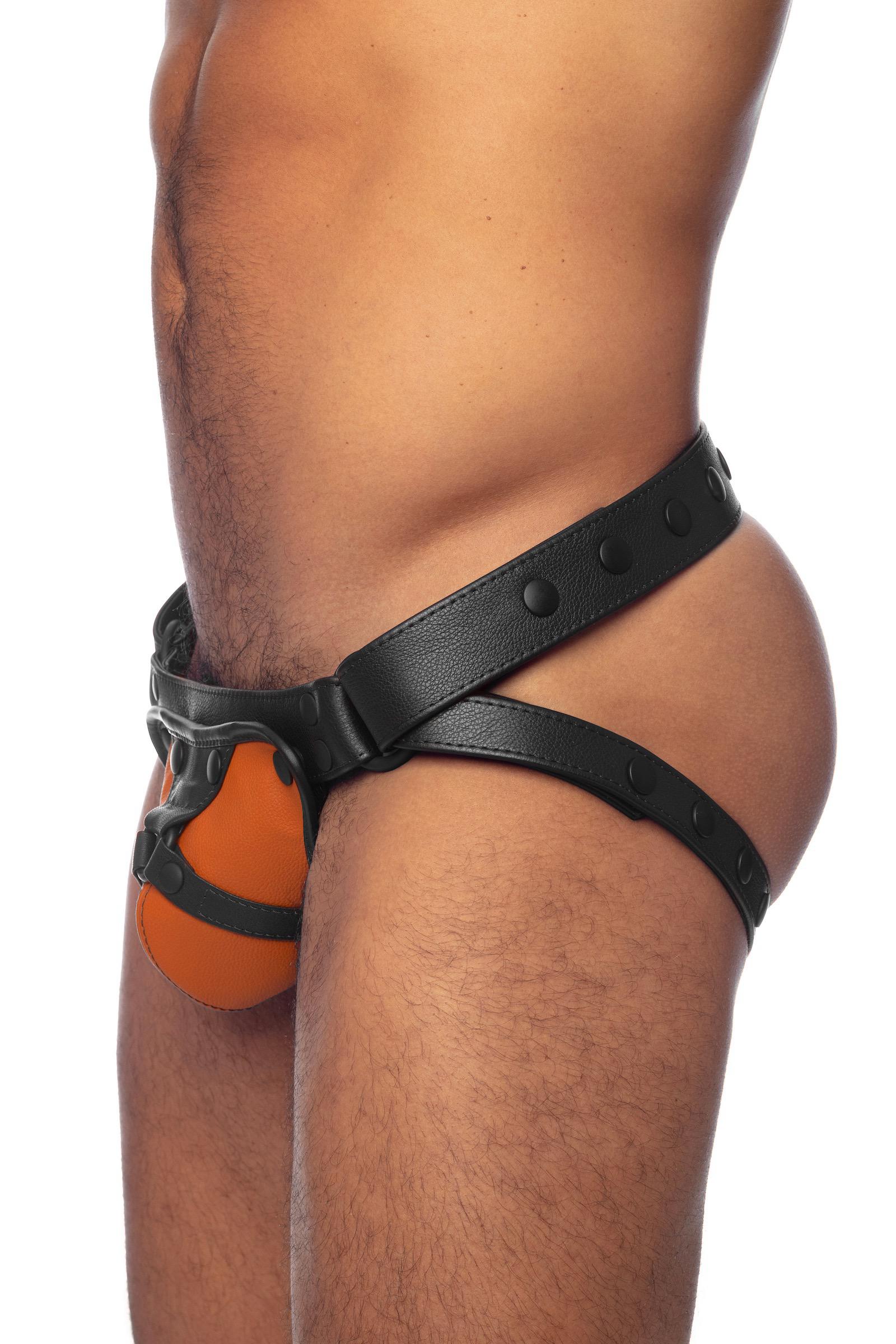 Orange and black leather jockstrap on a solid male model. Side view.