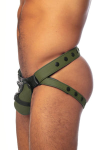 Side view of a male model in an army green and black leather jockstrap. 
