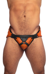 Front-on model wearing an orange and black leather jockstrap.