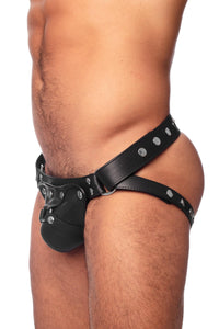 Model wearing a black leather harness jockstrap with stainless steel hardware. Side view.
