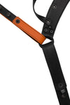 Flat view of lining side of a black and orange leather jockstrap