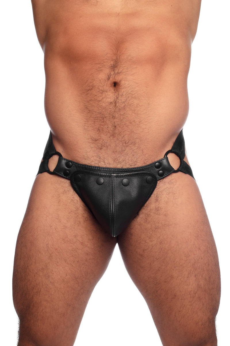 ARMY OF MEN quality HYBRID JOCK - Black with matte black O-rings styled on a thick model, facing forward.