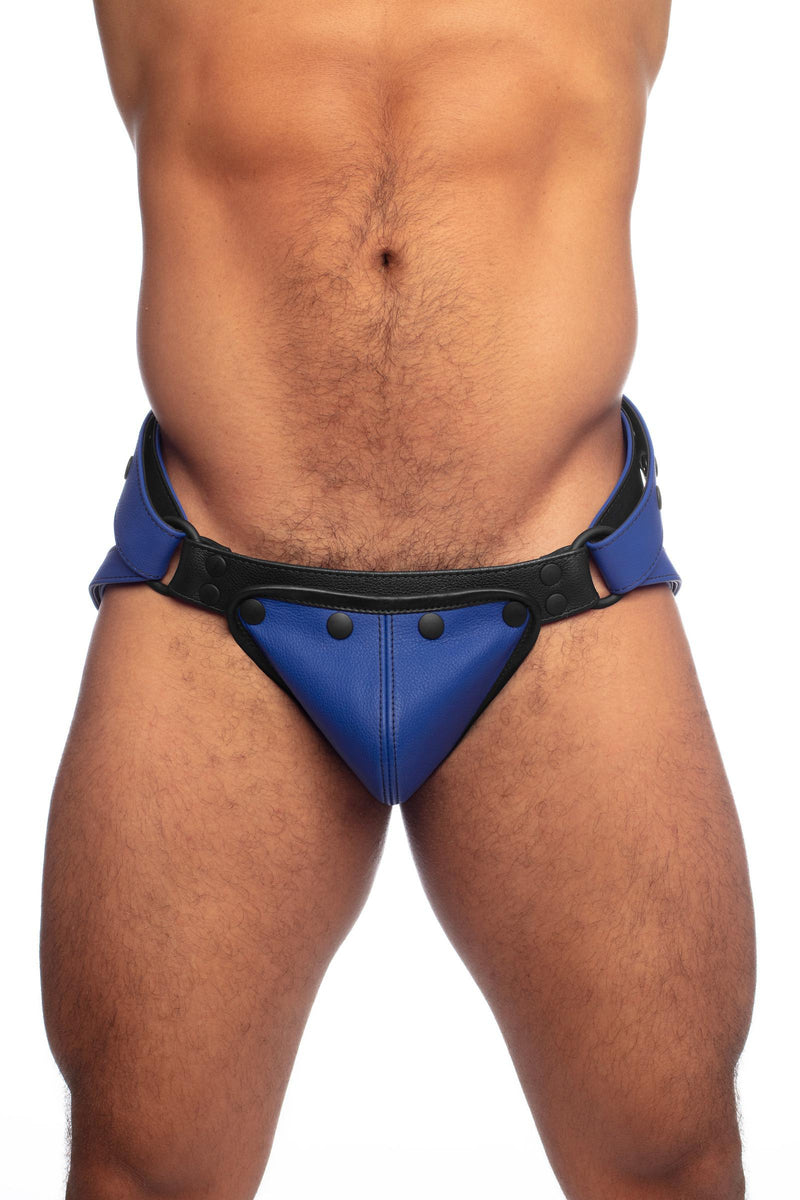 Toned model in a blue leather jockstrap and codpiece. Front view.