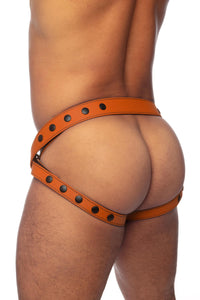 Thick male model wearing an orange leather jockstrap. Rear view.