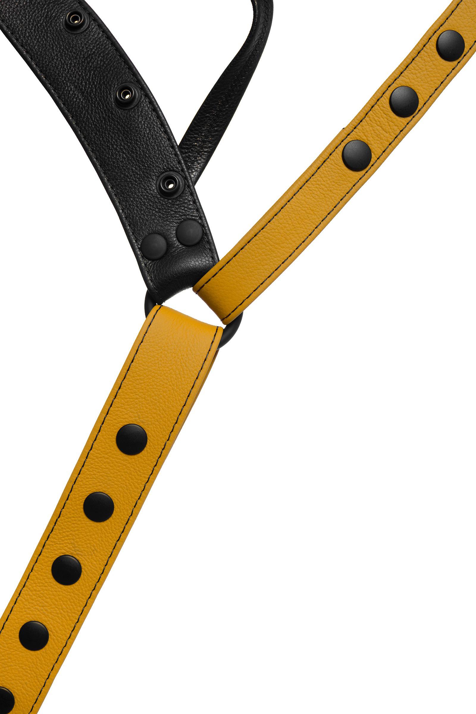 Close-up of a yellow leather jockstrap front.