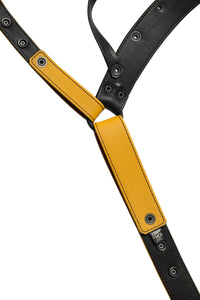 Detailed internal view of a yellow leather jockstrap.
