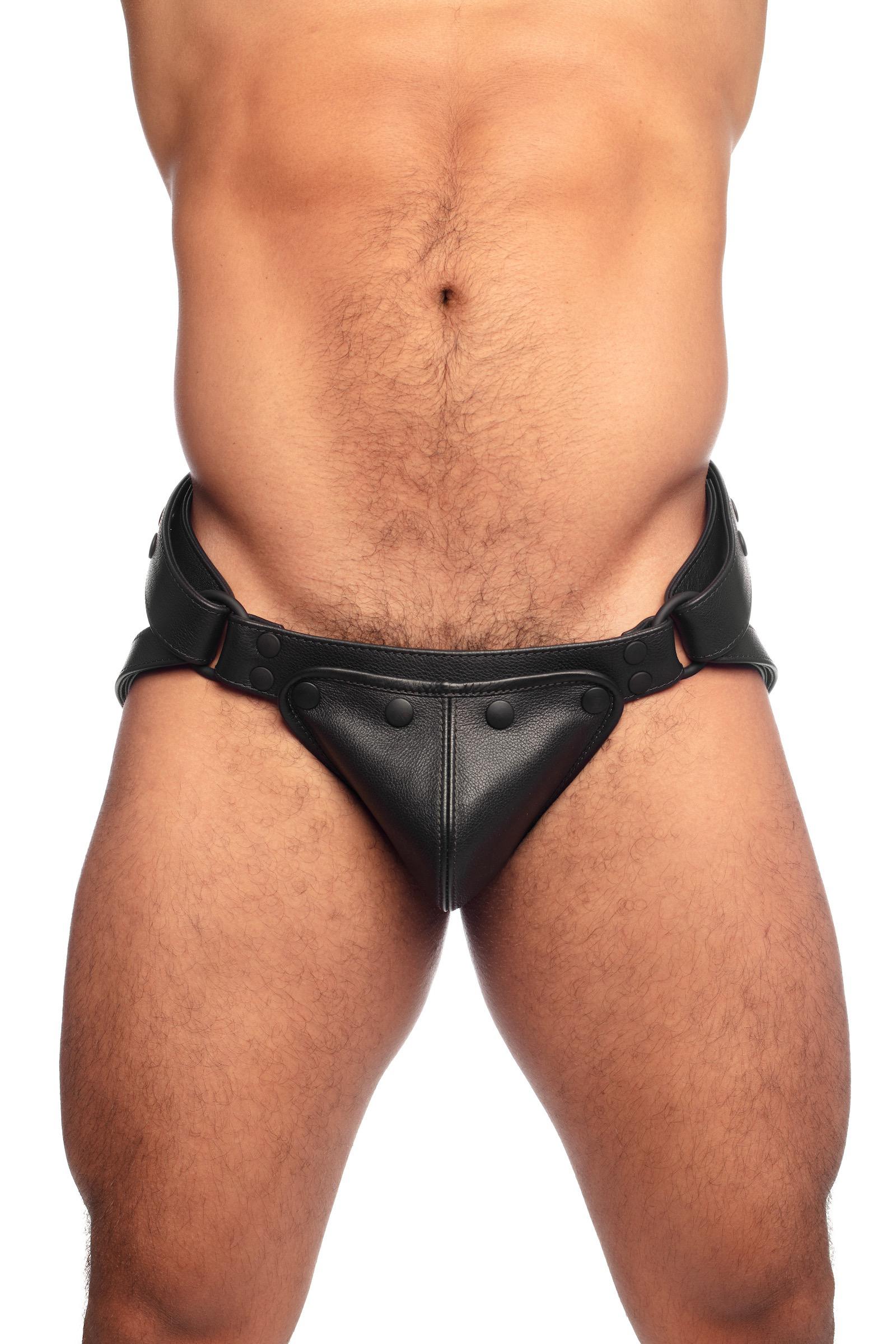 Black leather jockstrap worn by a thick male model, front view