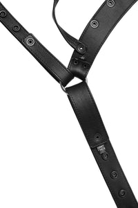 Detailed view of the lining of a black leather jockstrap with stainless steel hardware.