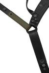 Flat view of lining side of a black and army green leather jockstrap