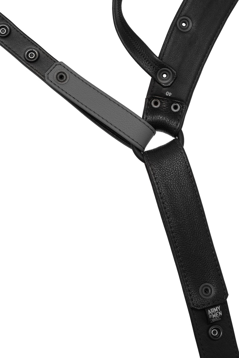 Flat view of lining side of a black and grey leather jockstrap