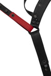 Flat view of lining side of a black and red leather jockstrap