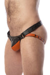 Side view of model wearing a black and orange leather jockstrap with shadow detail on codpiece