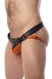 Side view of model wearing a black and orange leather jockstrap with shadow detail on codpiece