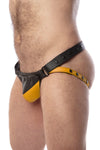Side view of model wearing a black and yellow leather jockstrap with shadow detail on codpiece
