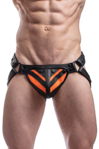 Male model facing forward in a handmade ARMY OF MEN FLURO STRIPE JOCK - Fluro Orange with black snaps, rivets, and O-rings.