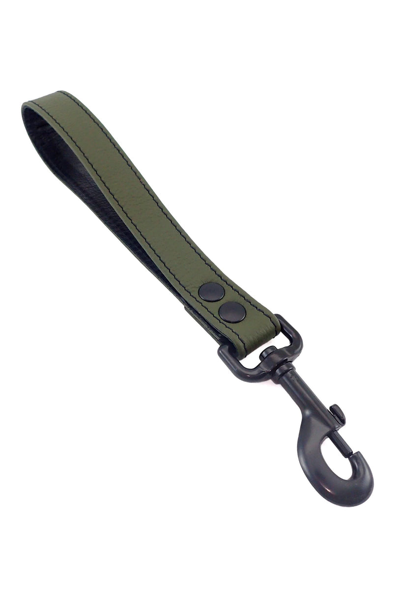 A 1-inch-wide ARMY OF MEN army green leather leash with matte black hardware, laid flat and viewed from above.
