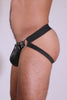 Male model in an ARMY OF MEN black elastic and leather jockstrap with stainless steel hardware.