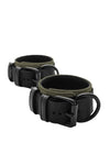 Coiled pair of 2.25" wide ARMY OF MEN ANKLE RESTRAINTS - Army Green with matte black buckles and D-rings.