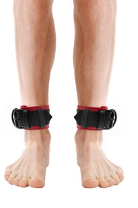Fit model in a pair of 2.25" wide ARMY OF MEN ANKLE RESTRAINTS - Red with matte black buckles and D-rings, front facing view.