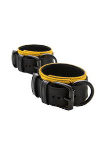 Pair of ARMY OF MEN 2.25" wide ANKLE RESTRAINTS - Yellow with matte black rivets, buckles, and D-rings, in coils.
