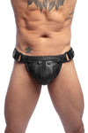 Male model in an Australian made ARMY OF MEN black leather Combat thong with matte black hardware, front facing view.