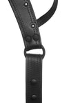 ARMY OF MEN original black leather Combat thong with black rivets, snaps, and O-rings, laid flat and viewed from above.