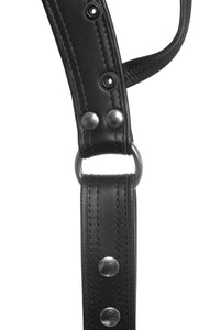 Flat lay view of an original ARMY OF MEN black leather Combat thong with stainless steel O-rings.