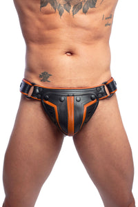 A quality ARMY OF MEN black and orange leather Combat thong with matte black hardware, worn by an Asian model.