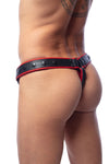 A tattooed Asian model turned away wearing an unique ARMY OF MEN COMBAT THONG - Red with matte black rivets.