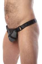 Model wearing a black leather thong with a grey harness codpiece. Matt black hardware. Side view.