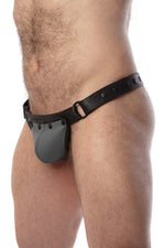 Model wearing a black leather thong with a grey codpiece. Matt black hardware. Side view.