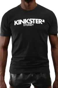 A fit Black model facing forward wearing a black organic cotton ARMY OF MEN "KINKSTER" t-shirt.