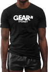 A defined model facing forward wearing a black organic cotton ARMY OF MEN "GEAR SYDNEY" t-shirt.