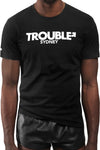 A black organic cotton ARMY OF MEN "TROUBLE" t-shirt, worn by a fit model.