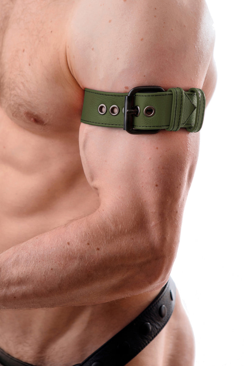 Model wearing an army green leather armband belt
