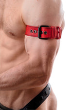 Model wearing a red leather armband belt