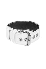 White leather armband belt with stainless steel buckle in a ring