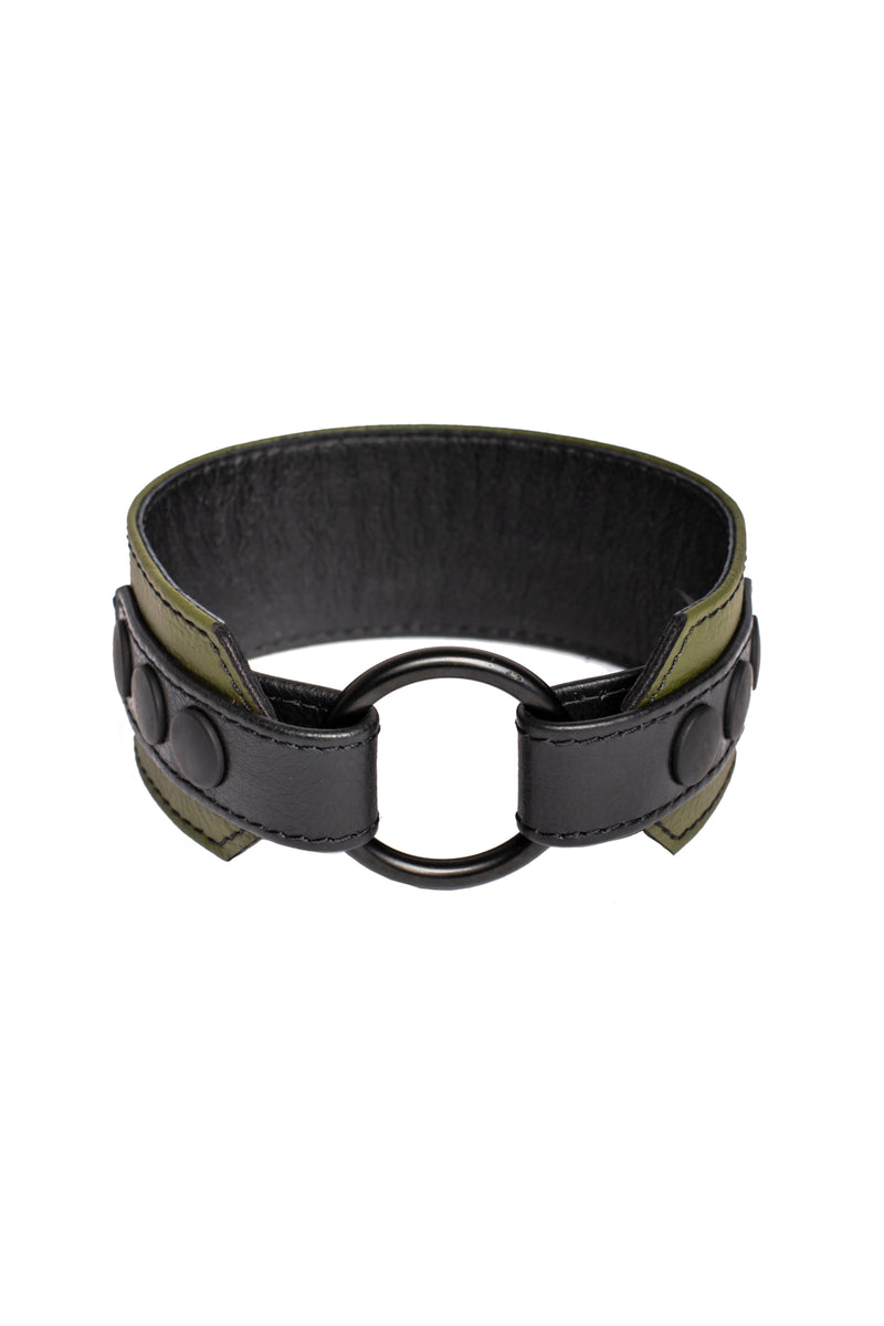An army green leather armband with black metal O-ring