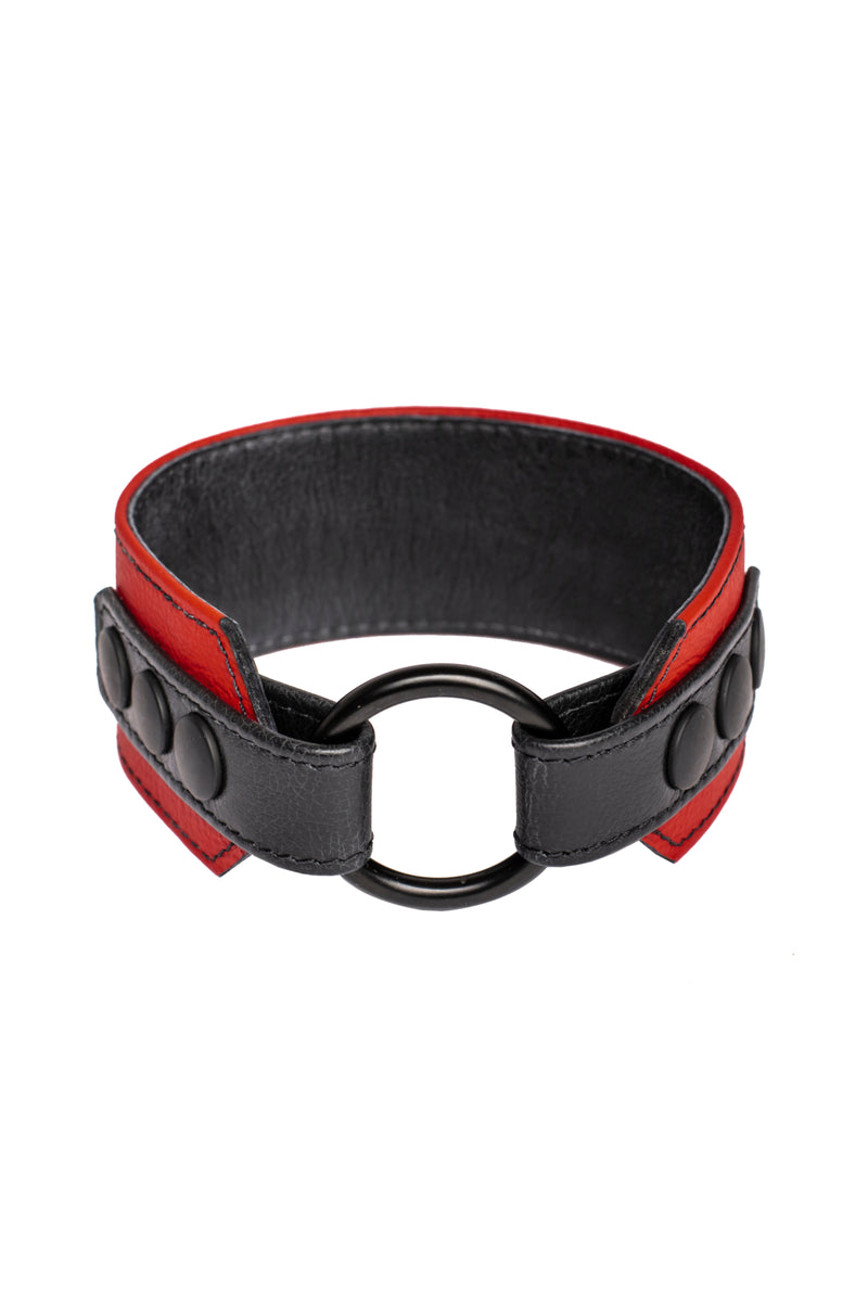 A red leather armband with black metal O-ring